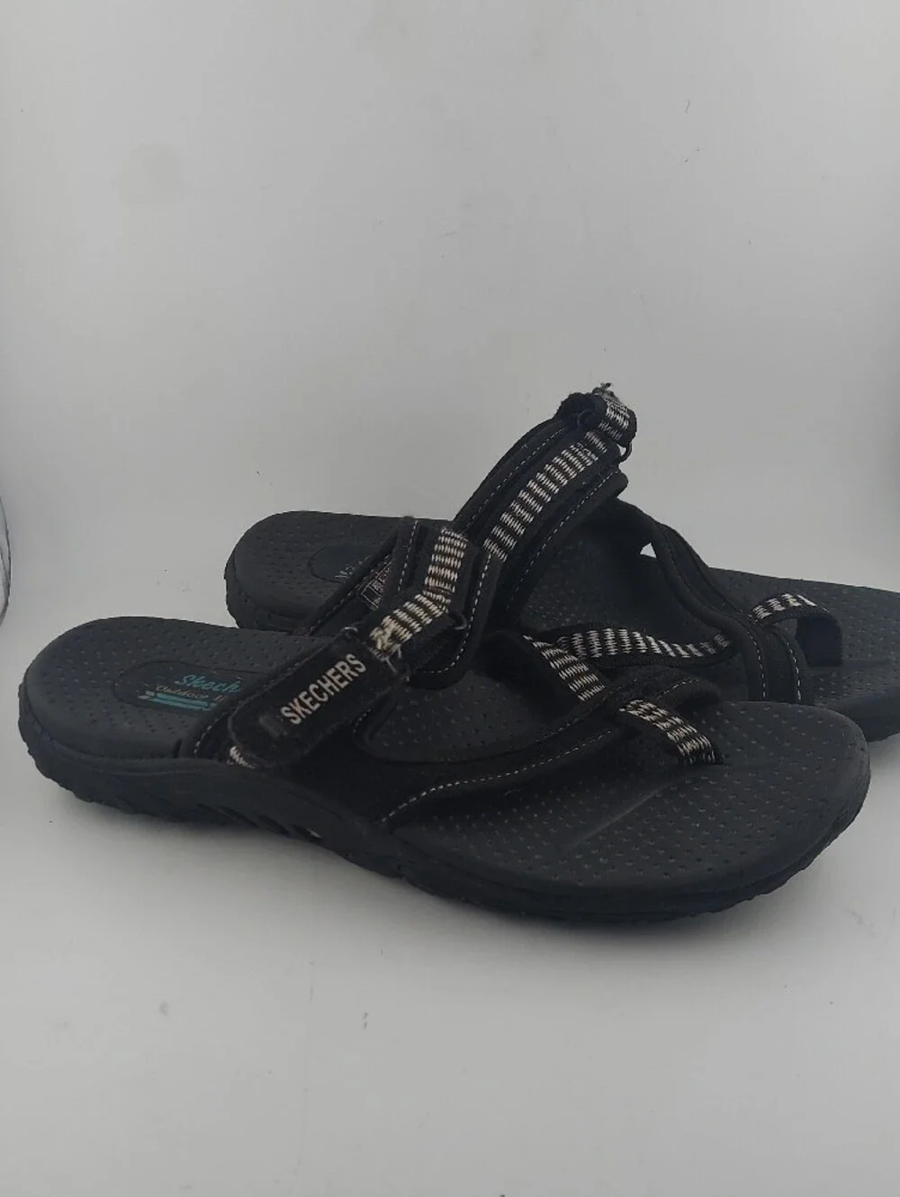 Skechers Womans Black Sandals with White-Striped Webbing
